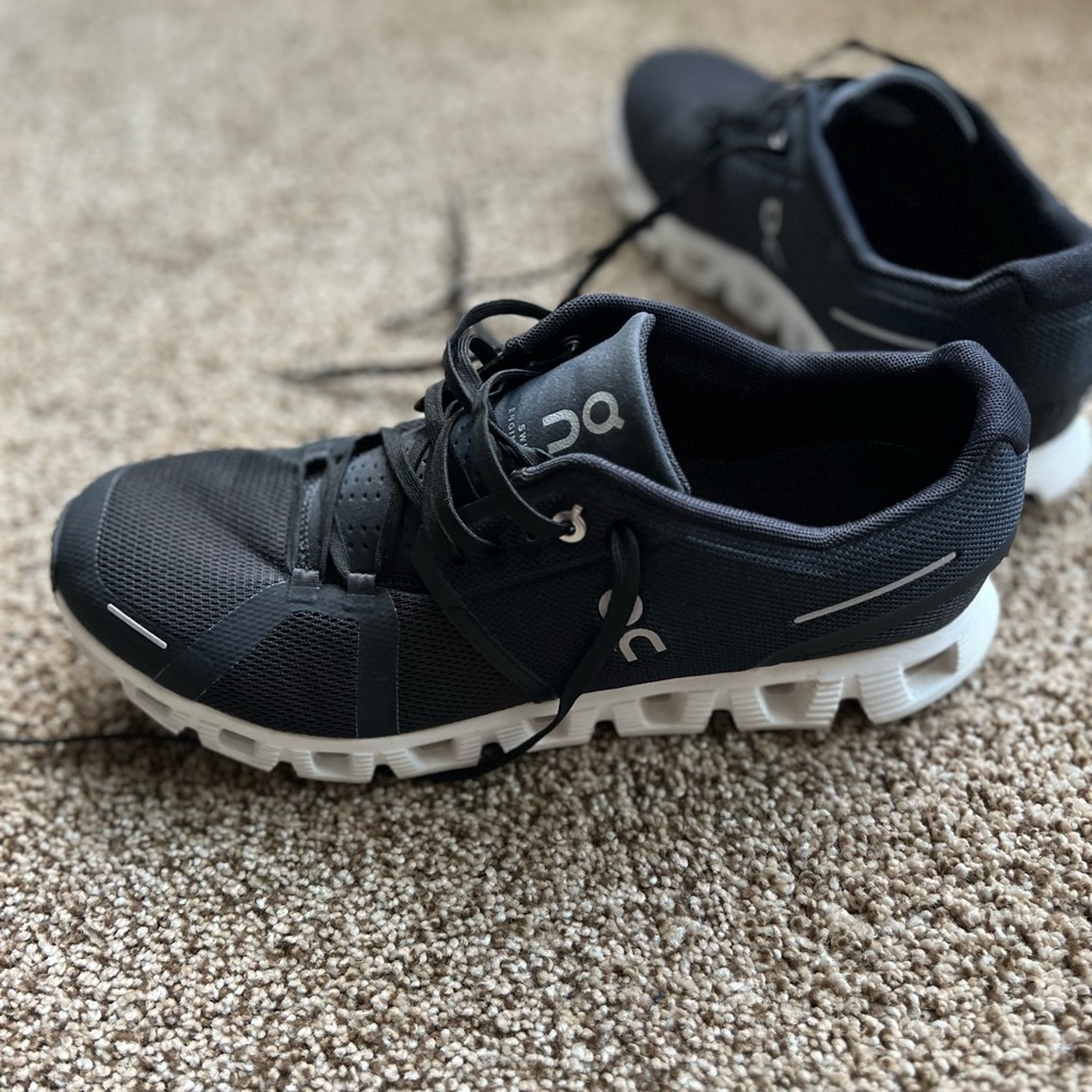 Black and white on clouds. Worn maybe five times. Great condition.